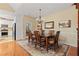 Elegant dining room with a chandelier and hardwood floors at 7802 Bamby Rd, Cumming, GA 30041