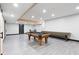 Finished basement with pool table, shuffleboard, and ample space at 7802 Bamby Rd, Cumming, GA 30041