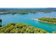 Stunning aerial view of lakefront property at 7802 Bamby Rd, Cumming, GA 30041