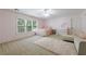 Charming bedroom with light pink walls, ceiling fan and sitting area at 1112 Osprey Nw Rdg, Kennesaw, GA 30152