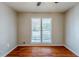 Bedroom with hardwood floors and window at 271 Kings Walk, Douglasville, GA 30134