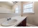 Clean bathroom with single sink vanity and shower/tub combo at 290 Charlotte Blvd, Stockbridge, GA 30281