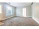 Spacious living room with carpet and neutral walls at 290 Charlotte Blvd, Stockbridge, GA 30281