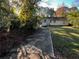 Large backyard with a concrete patio area at 4256 Lindsey Dr, Decatur, GA 30035