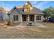 House backyard with patio and fire pit at 4330 Balsam Bark Dr, Cumming, GA 30028