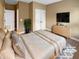 Bedroom with double doors and carpet flooring at 4330 Balsam Bark Dr, Cumming, GA 30028