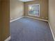 Empty bedroom with neutral wall and carpet at 4330 Balsam Bark Dr, Cumming, GA 30028