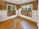 Breakfast nook with hardwood floors, window seats, and plantation shutters at 4330 Balsam Bark Dr, Cumming, GA 30028