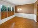 Dining room with hardwood floors and wood shutters at 4330 Balsam Bark Dr, Cumming, GA 30028