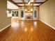 Hardwood floor living room with a fireplace at 4330 Balsam Bark Dr, Cumming, GA 30028