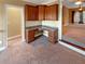 Built-in office space with wood cabinets and granite countertop at 4330 Balsam Bark Dr, Cumming, GA 30028