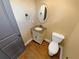 Powder room with pedestal sink and toilet at 4330 Balsam Bark Dr, Cumming, GA 30028