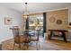 Dining area with glass table, chairs, and deck access at 3798 Valley Brook Rd, Snellville, GA 30039