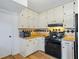 Bright eat-in kitchen with wood countertops and ample cabinet space at 3798 Valley Brook Rd, Snellville, GA 30039