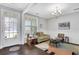 Light-filled living room with hardwood floors and seating area at 3170 Blackshear Dr, Marietta, GA 30060