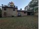 Back of house, showing patio and yard at 4414 Blackbirch Ln, Decatur, GA 30034