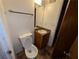 Small bathroom with a toilet and vanity at 4414 Blackbirch Ln, Decatur, GA 30034