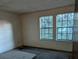 Decent sized bedroom with double windows and carpet at 4414 Blackbirch Ln, Decatur, GA 30034