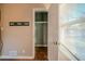 Small bedroom closet with wood flooring and neutral walls at 2693 Larkspur Se Dr, Atlanta, GA 30316