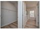 Walk-in closet with built-in shelving and access to the bathroom at 5981 Northbend Ct, Douglasville, GA 30134