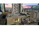 Elevated rooftop deck showcasing urban views at sunset at 90 Fairlie Street Nw #801 # 801, Atlanta, GA 30303