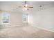 Spacious bedroom with ceiling fan and carpet flooring at 2291 Elise Way, Hampton, GA 30228
