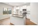 Kitchen features a large island with granite countertops at 2291 Elise Way, Hampton, GA 30228