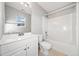 Modern bathroom with white fixtures, tub/shower combo, and bright lighting at 220 Cottonwood Creek Cir, Canton, GA 30114