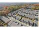Aerial view of townhouses with fall foliage at 510 Cooper Ln, Woodstock, GA 30189