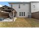 Private backyard with a covered patio and spacious grassy area at 510 Cooper Ln, Woodstock, GA 30189