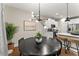 Dining room with a round table and modern chandelier at 510 Cooper Ln, Woodstock, GA 30189