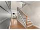 Bright and spacious entryway with hardwood floors and modern light fixture at 510 Cooper Ln, Woodstock, GA 30189