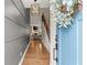 Bright and spacious entryway with hardwood floors and modern light fixture at 510 Cooper Ln, Woodstock, GA 30189