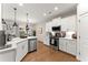 Modern kitchen with stainless steel appliances and white cabinetry at 510 Cooper Ln, Woodstock, GA 30189