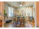 Cozy dining area with a table for four and hardwood floors at 3182 Latona Sw Dr, Atlanta, GA 30354