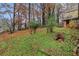 Spacious backyard with lush greenery and mature trees at 2052 Brannen Se Rd, Atlanta, GA 30316