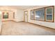 Spacious living room with neutral carpeting at 2052 Brannen Se Rd, Atlanta, GA 30316