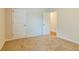 Well-lit bedroom with carpet flooring and neutral colors at 231 Orwell Dr, Social Circle, GA 30025
