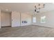 Spacious living room featuring hardwood floors and a fireplace at 231 Orwell Dr, Social Circle, GA 30025