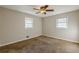 Spacious bedroom with carpet and ceiling fan at 936 Green Valley Sw Rd, Mableton, GA 30126