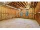 Unfinished basement area with windows and potential for expansion at 230 Wessex Ct, Atlanta, GA 30328