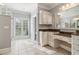 Bathroom boasts dual vanities and a walk-in shower at 230 Wessex Ct, Atlanta, GA 30328