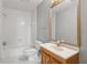 Clean bathroom with a tub, toilet and vanity at 230 Wessex Ct, Atlanta, GA 30328