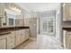 Elegant bathroom with granite countertops and a large mirror at 230 Wessex Ct, Atlanta, GA 30328