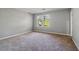Bright bedroom with window and neutral decor at 230 Wessex Ct, Atlanta, GA 30328