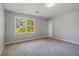 Bright bedroom with window and neutral decor at 230 Wessex Ct, Atlanta, GA 30328