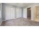 Bedroom with double closets and carpet at 230 Wessex Ct, Atlanta, GA 30328