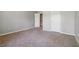 Spacious bedroom with neutral walls and carpet at 230 Wessex Ct, Atlanta, GA 30328