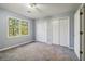 Bedroom with double closets and carpet at 230 Wessex Ct, Atlanta, GA 30328