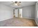 Bedroom with ceiling fan and access to bathroom at 230 Wessex Ct, Atlanta, GA 30328